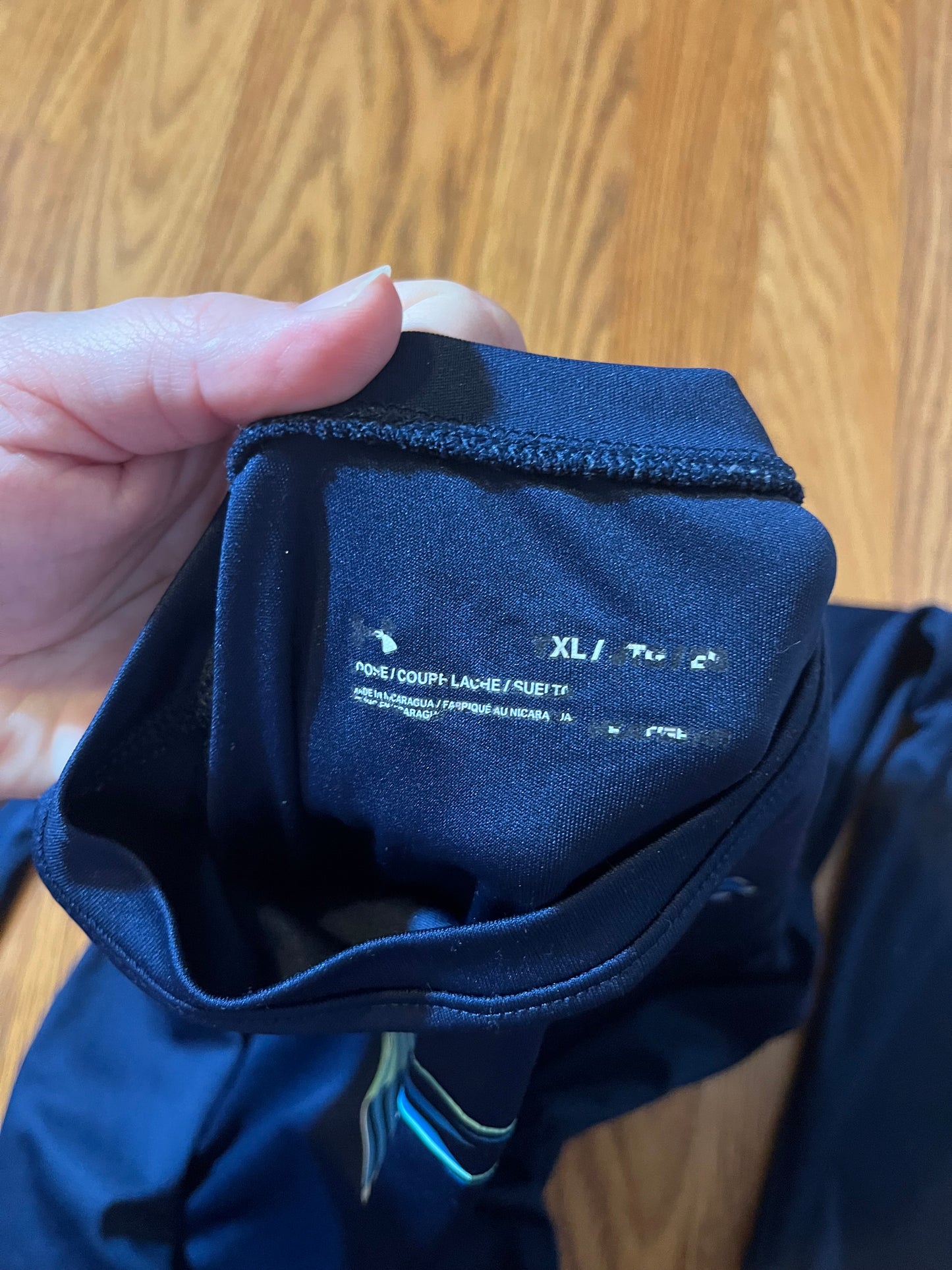 Under Armour boys long sleeve top size XL (online chart says 16/18?)