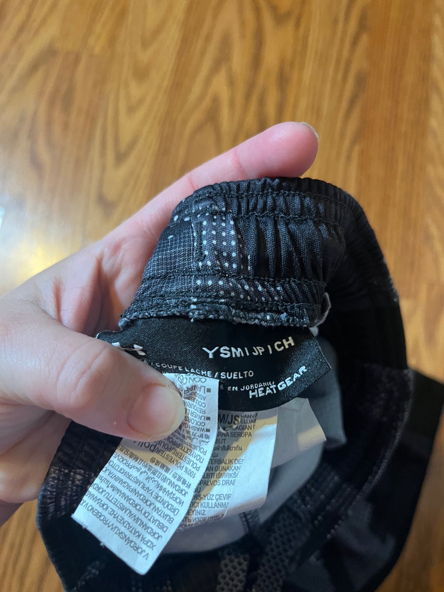 Under Armour shorts size YSM (online chart says 7/8)