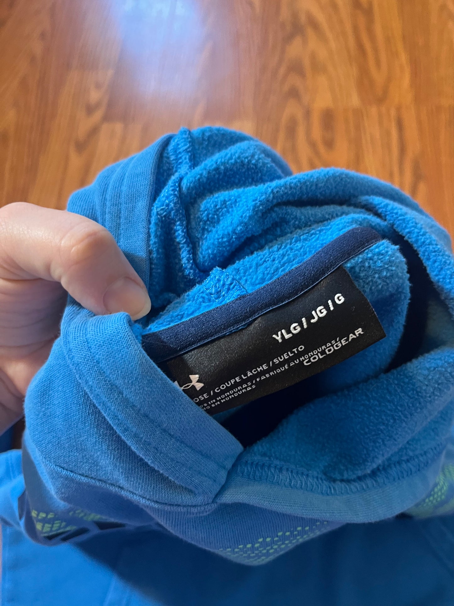 Under Armour Boys hoodie size YLG (cracking on emblem on front shown an extra photo)