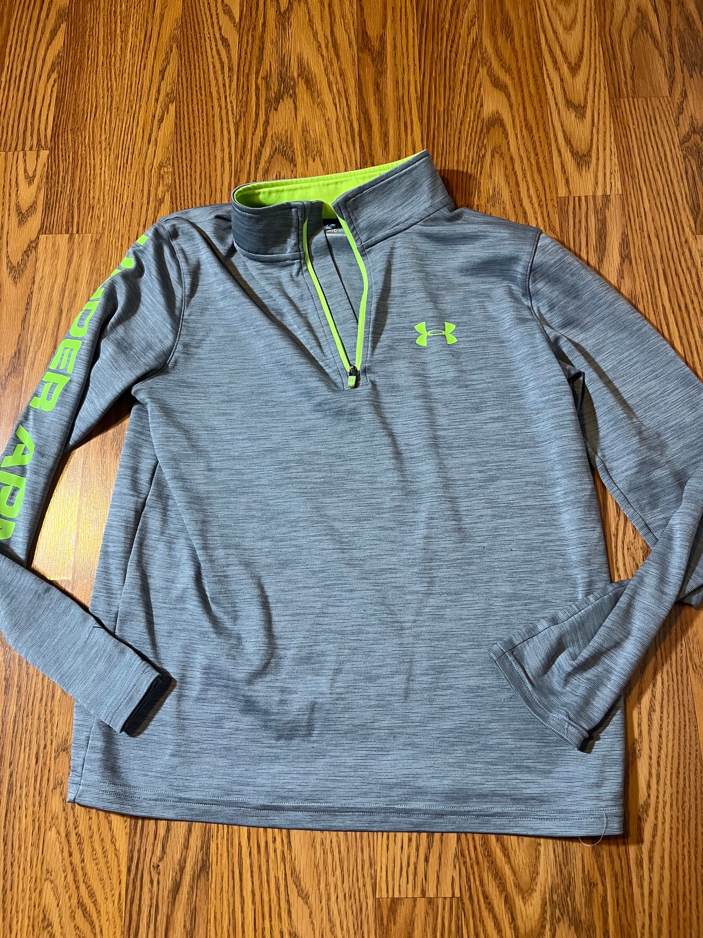 Under Armour YLG (online chart says size 14) a little bit aware on the emblem, but not bad extra photo to show