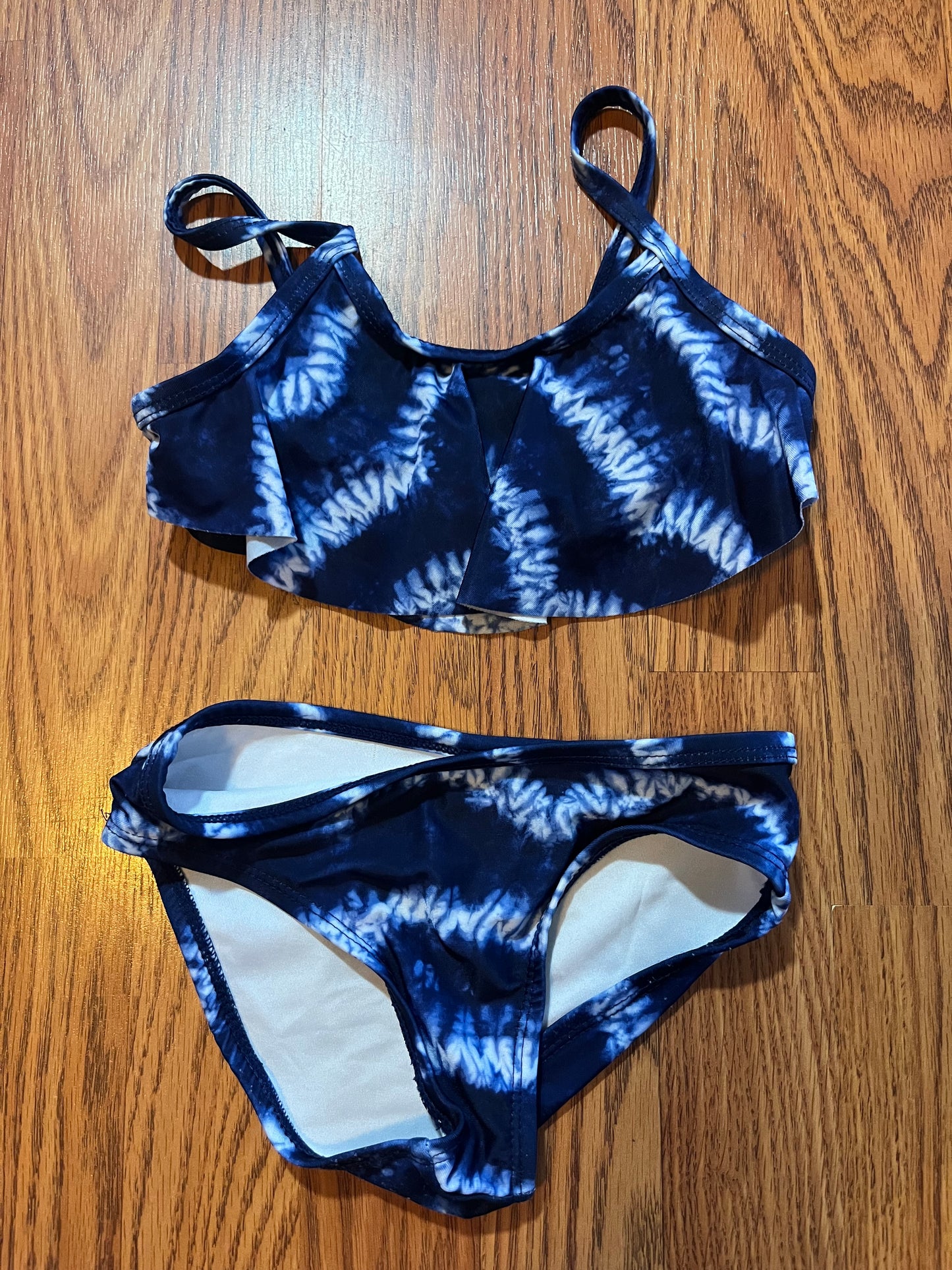 Gymboree girls swimming suit size 4 (some wear in the bottom as shown but not awful)