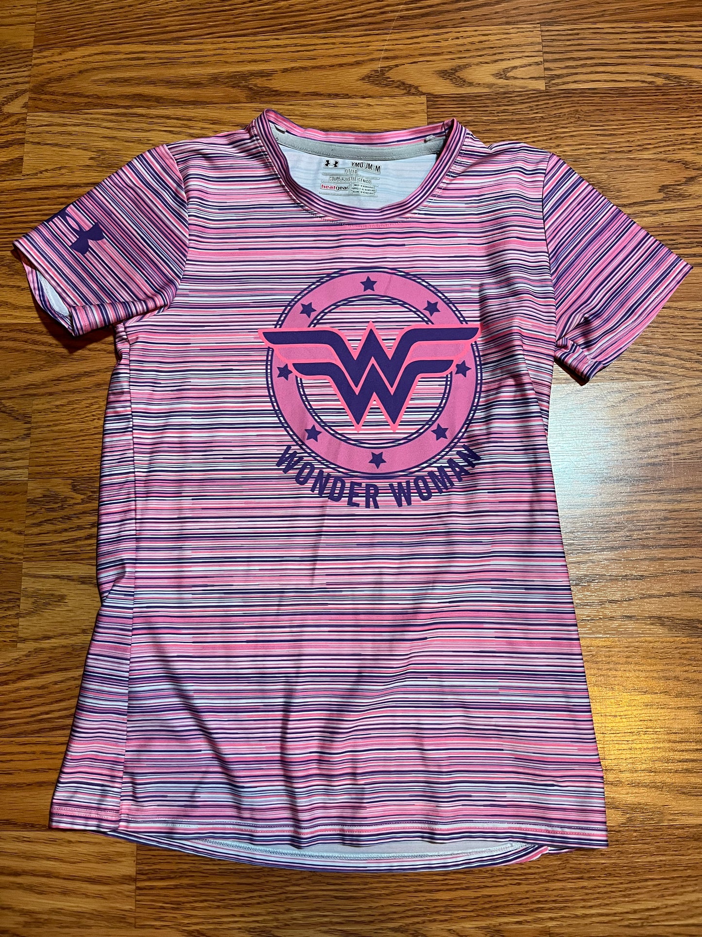 Under Armour wonder women youth medium tshirt (looks to fit size 10)