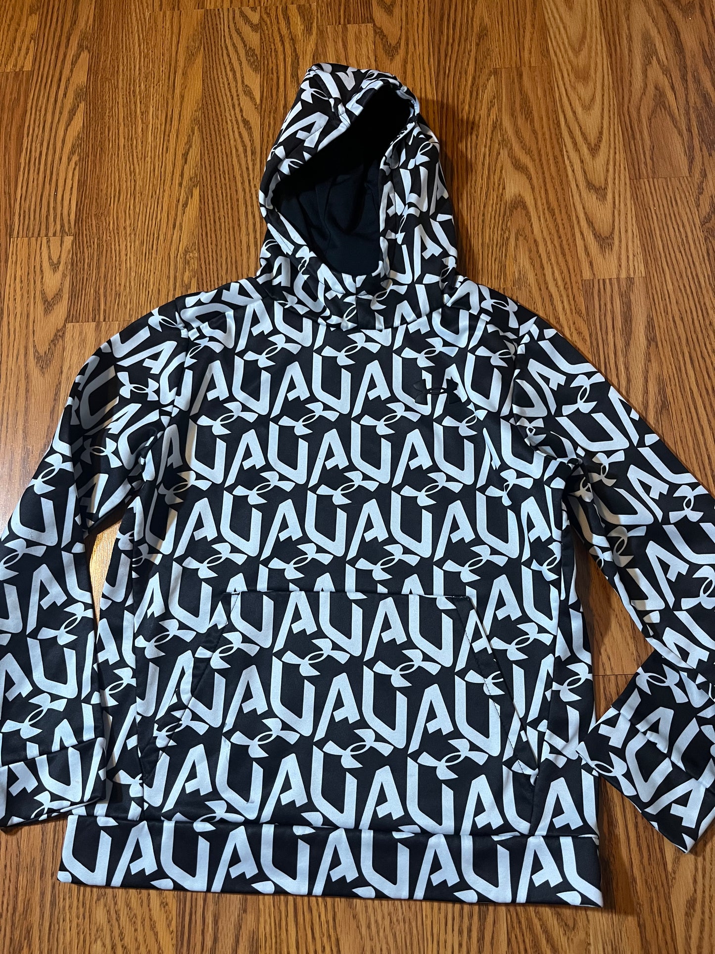 Under Armour hoodie size YMD (online chart says 10/12 but would fit size 8 with room!) very small marker but hardly noticeable extra photo to show
