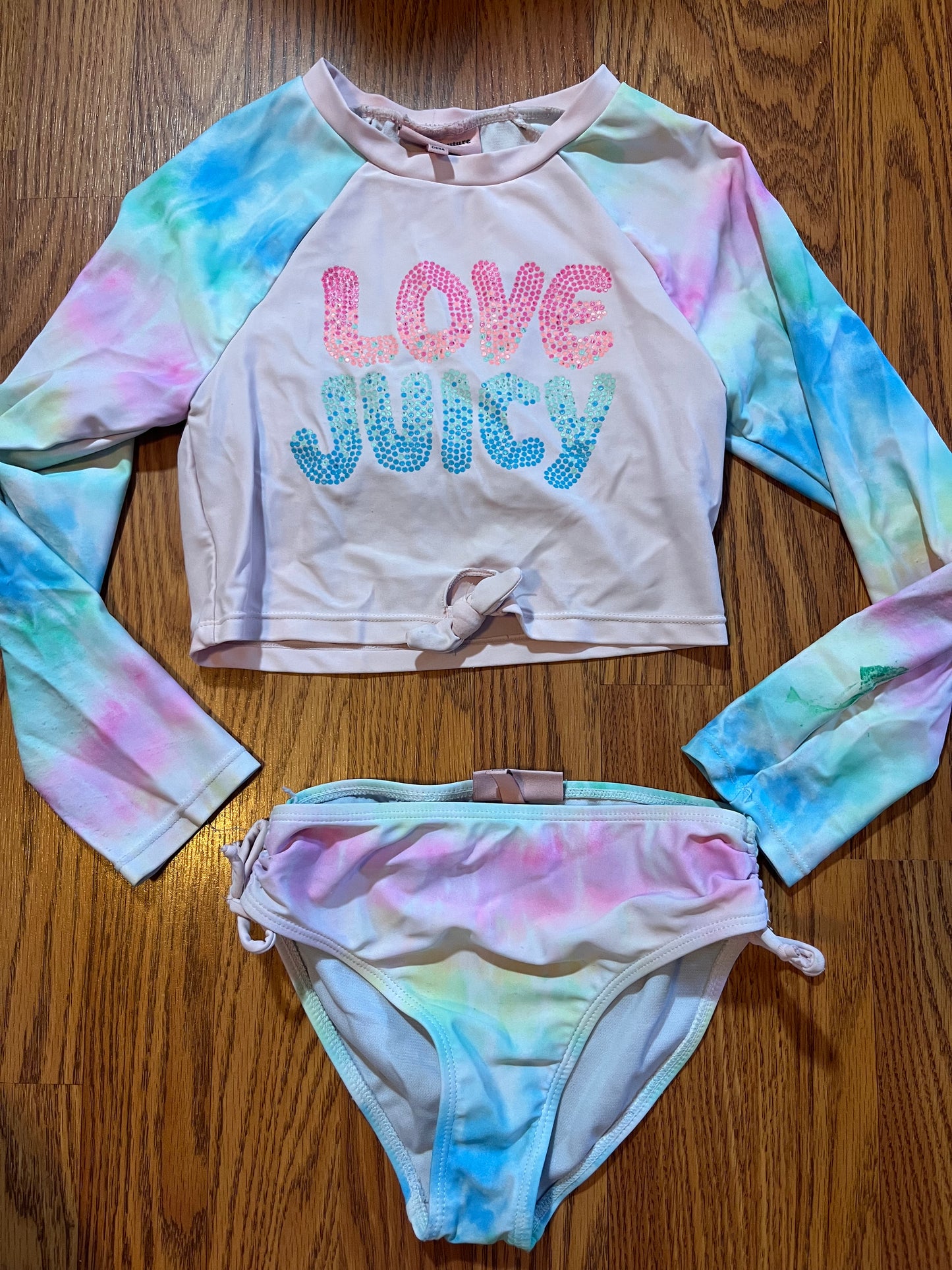 Juicy couture swimsuit size 8 (has paint on sleeve / wear on bottoms as shown In photos!!)