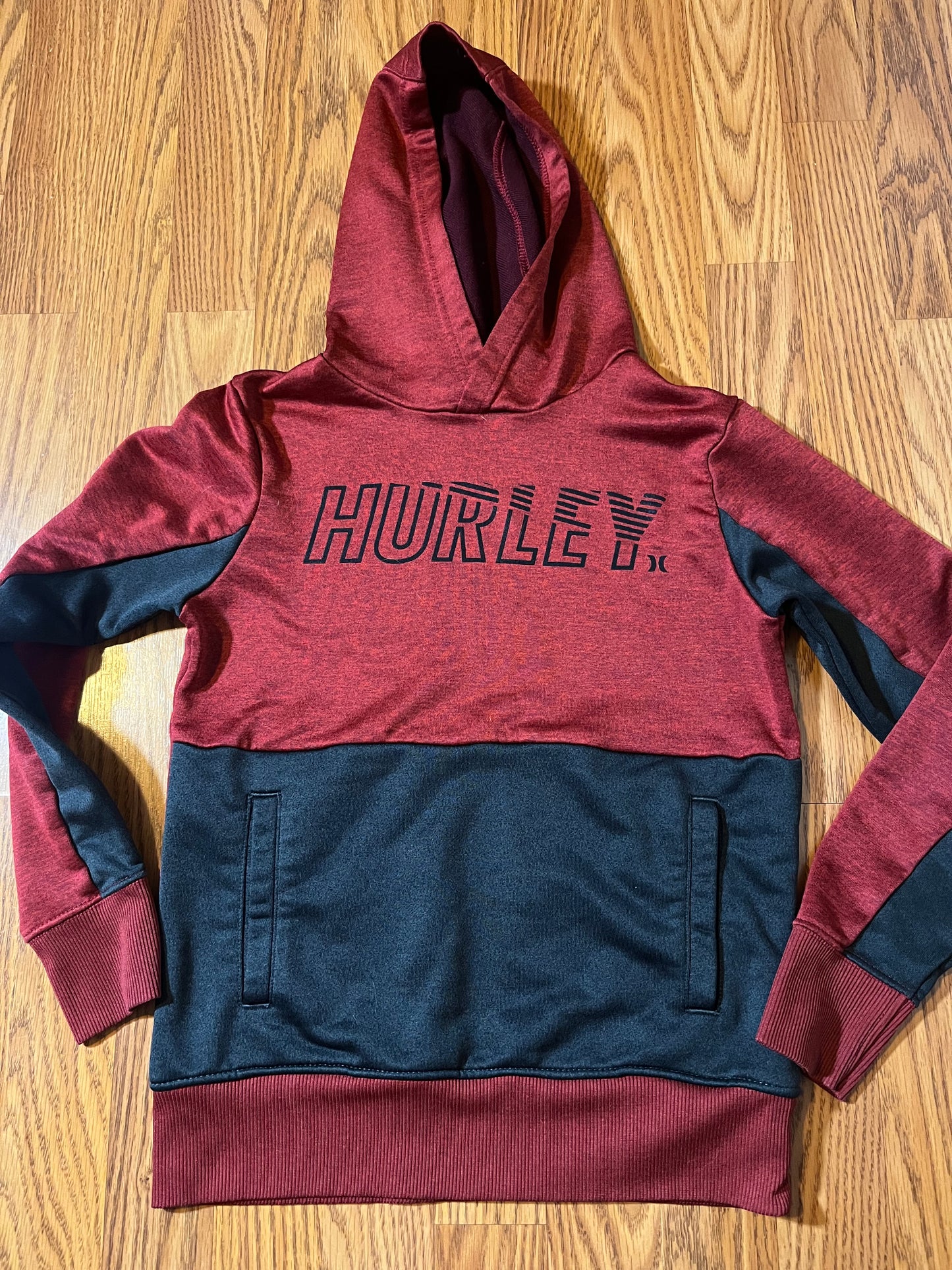 Hurley Boys size Medium (online in chart says 10/12 but I would think it would fit a size 8 oversized?)