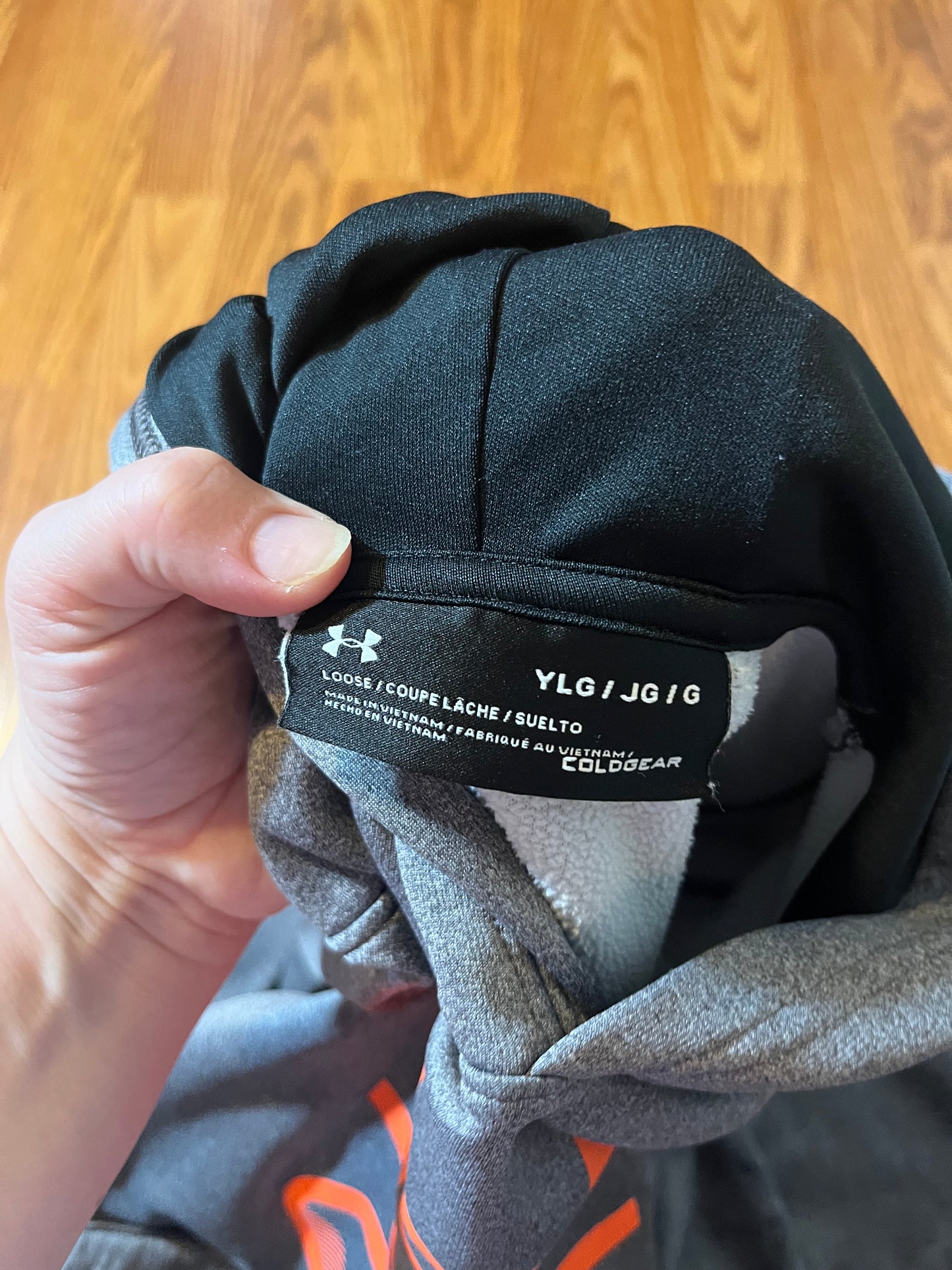 Under Armour hoodie size YLG (online chart says 14 but looks a lot smaller!)